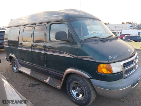 1999 Dodge Ram Van Conversion with VIN 2B6HB11Y8XK546999, listed as a IAAI auction lot 40672821 with NaN miles. Bid and sale history available at carsss.com. Image 13.