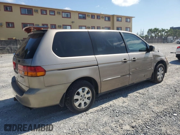 2004 Honda Odyssey EX-RES z VIN 5FNRL18814B125773, wystawiony jako Copart lot #58205565 z przebiegiem 250 732 mil mil oraz Szkoda całkowita • Salvage title. Historia ofert i sprzedaży dostępna na DreamBid. Obrazek 3.