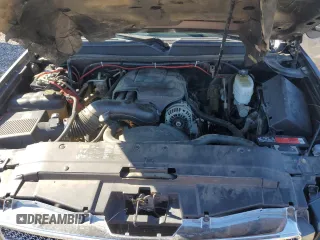 2013 Chevrolet Suburban LS z VIN 1GNWKLEG4DR113485, wystawiony jako Copart lot #80772604 z przebiegiem 183 622 mil mil oraz Szkoda całkowita • Salvage title. Historia ofert i sprzedaży dostępna na DreamBid. Obrazek 13.