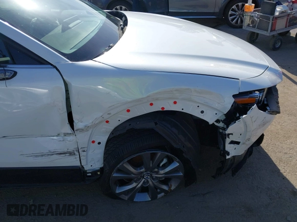 2024 Mazda CX-30 S Premium with VIN 3MVDMBDM4RM616159, listed as a IAAI auction lot 42328334 with 4,614 mi miles and . Bid and sale history available at DreamBid. Image 6.