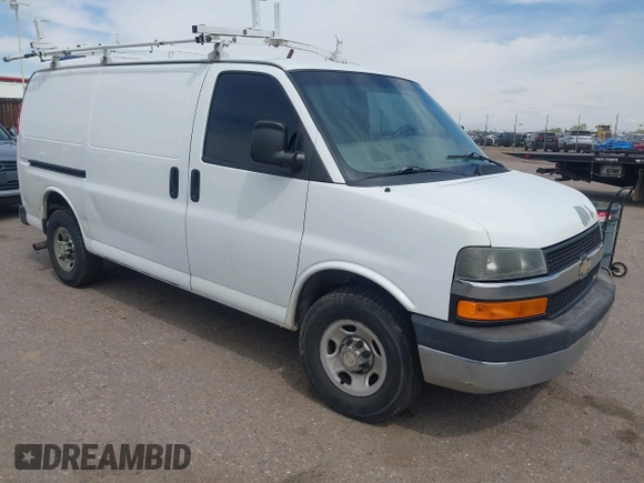 2012 Chevrolet Express Cargo Van with VIN 1GCWGFCA7C1121989, listed as a IAAI auction lot 42118853 with 214,478 mi miles. Bid and sale history available at carsss.com. Image 1.