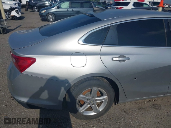 2019 Chevrolet Malibu LS with VIN 1G1ZB5STXKF147683, listed as a IAAI auction lot 42123608 with 104,692 mi miles and . Bid and sale history available at DreamBid. Image 19.