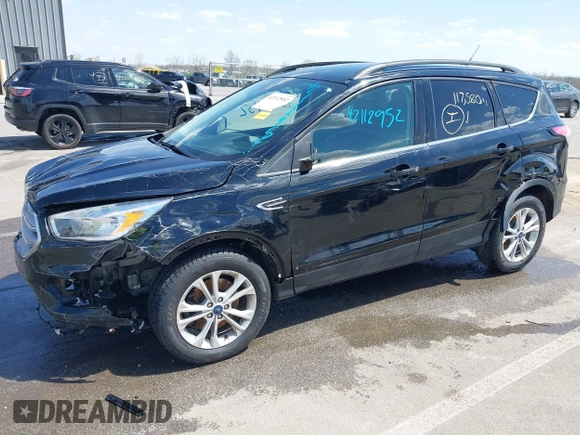2018 Ford Escape SE z VIN 1FMCU9GD1JUD48846, wystawiony jako IAAI lot #42112952 z przebiegiem 117 580 mil mil oraz . Historia ofert i sprzedaży dostępna na DreamBid. Obrazek 6.