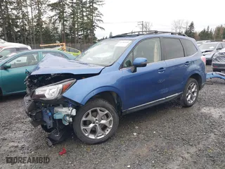 2018 Subaru Forester Touring with VIN JF2SJAWC0JH519616, listed as a IAAI auction lot 41783548 with 36,251 mi miles. Bid and sale history available at carsss.com. Image 2.