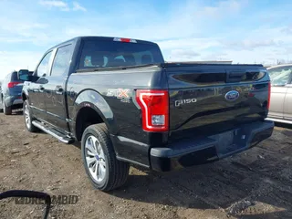 2017 Ford F-150 XL with VIN 1FTEW1EP7HFB65004, listed as a IAAI auction lot 41876164 with 105,487 mi miles. Bid and sale history available at carsss.com. Image 3.