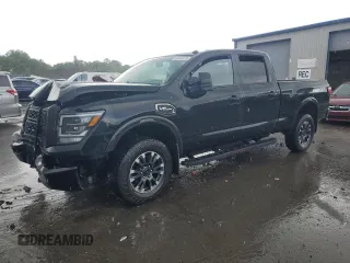 2021 Nissan Titan Platinum Reserve z VIN 1N6AA1FB9MN532756, wystawiony jako Copart lot #58149575 z przebiegiem Nie podano mil oraz Szkoda całkowita • Salvage title. Historia ofert i sprzedaży dostępna na DreamBid. Obrazek 1.