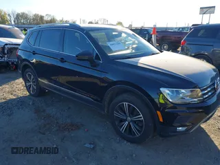 2018 Volkswagen Tiguan SEL z VIN 3VV3B7AX7JM117053, wystawiony jako IAAI lot #40827695 z przebiegiem 71 489 mil mil oraz . Historia ofert i sprzedaży dostępna na DreamBid. Obrazek 1.