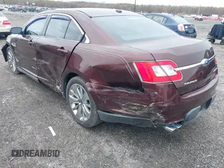 2010 Ford Taurus Limited with VIN 1FAHP2FW6AG144074, listed as a IAAI auction lot 41945777 with 135,096 mi miles. Bid and sale history available at carsss.com. Image 3.