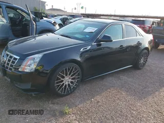 2012 Cadillac CTS with VIN 1G6DA5E55C0115278, listed as a IAAI auction lot 41953406 with 124,441 mi miles and . Bid and sale history available at DreamBid. Image 2.