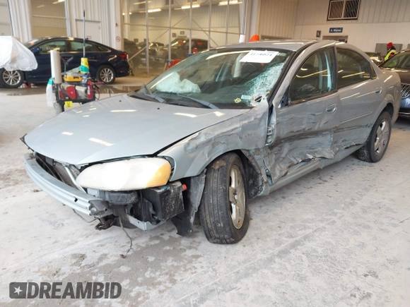 2002 Dodge Stratus z VIN 1B3EL56R42N276530, wystawiony jako IAAI lot #41726024 z przebiegiem 150 610 mil mil oraz . Historia ofert i sprzedaży dostępna na DreamBid. Obrazek 2.