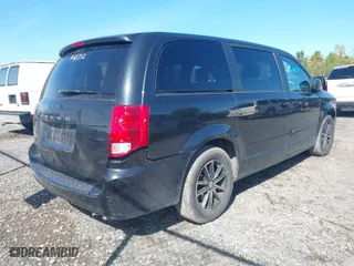 2015 Dodge Grand Caravan SE with VIN 2C4RDGBG3FR624498, listed as a IAAI auction lot 40400068 with 96,596 mi miles. Bid and sale history available at carsss.com. Image 4.