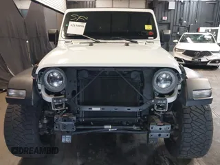 2019 Jeep Wrangler Unlimited Sport S z VIN 1C4HJXDG4KW639403, wystawiony jako IAAI lot #42158096 z przebiegiem 132 569 mil mil oraz . Historia ofert i sprzedaży dostępna na DreamBid. Obrazek 6.
