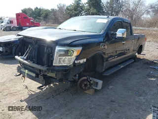 2016 Nissan Titan XD Platinum Reserve with VIN 1N6BA1F27GN506410, listed as a IAAI auction lot 41768621 with 159,404 mi miles. Bid and sale history available at carsss.com. Image 18.