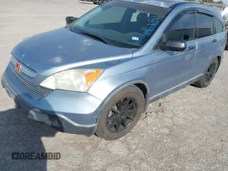2009 Honda CR-V EX with VIN JHLRE38599C004833, listed as a IAAI auction lot 41982725 with 212,280 mi miles and . Bid and sale history available at carsss.com. Image 6.