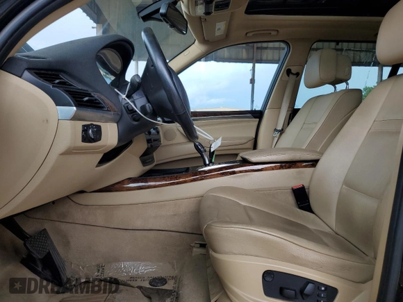 2012 BMW X5 35i with VIN 5UXZV4C54CL990112, listed as a Copart auction lot 59125245 with 142,742 mi miles and Clean title. Bid and sale history available at DreamBid. Image 7.