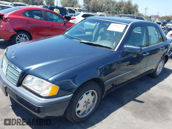 1997 Mercedes-Benz C z VIN WDBHA23EXVA514988, wystawiony jako IAAI lot #42503544 z przebiegiem 142 312 mil mil oraz . Historia ofert i sprzedaży dostępna na DreamBid. Obrazek 2.