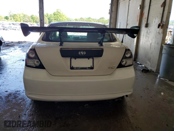 2005 Scion tC z VIN JTKDE177650011368, wystawiony jako Copart lot #56408015 z przebiegiem 165 731 mil mil oraz Szkoda całkowita • Salvage title. Historia ofert i sprzedaży dostępna na DreamBid. Obrazek 6.