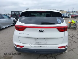2018 Kia Sportage LX with VIN KNDPM3AC1J7413227, listed as a IAAI auction lot 42188566 with 77,897 mi miles and . Bid and sale history available at carsss.com. Image 16.