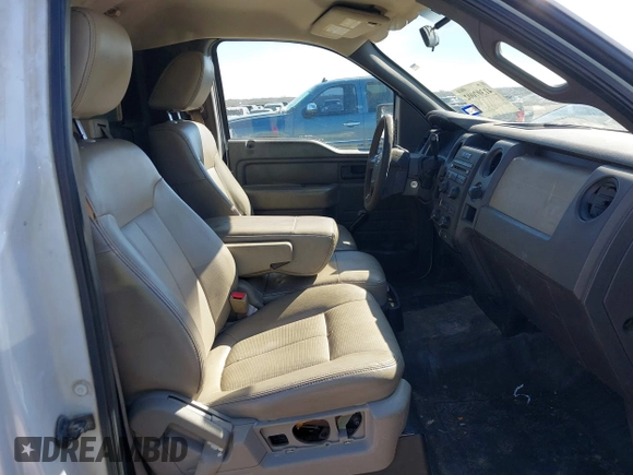 2009 Ford F-150 XL with VIN 1FTRF12839KA68521, listed as a IAAI auction lot 41307002 with 191,999 mi miles. Bid and sale history available at carsss.com. Image 5.