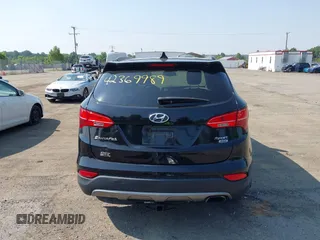 2014 Hyundai Santa Fe with VIN 5XYZUDLB9EG187420, listed as a IAAI auction lot 42369989 with 181,713 mi miles and . Bid and sale history available at DreamBid. Image 17.