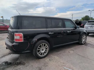 2009 Ford Flex SEL z VIN 2FMEK62CX9BA14490, wystawiony jako Copart lot #58776655 z przebiegiem 214 426 mil mil oraz Szkoda całkowita • Salvage title. Historia ofert i sprzedaży dostępna na DreamBid. Obrazek 3.