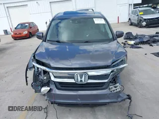 2020 Honda Pilot EX-L with VIN 5FNYF5H59LB014497, listed as a IAAI auction lot 41527415 with 66,625 mi miles. Bid and sale history available at carsss.com. Image 13.