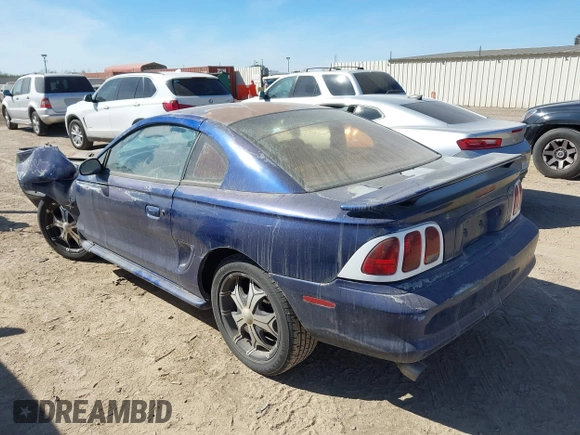 1996 Ford Mustang with VIN 1FALP4044TF223135, listed as a IAAI auction lot 41390359 with 199,143 mi miles. Bid and sale history available at carsss.com. Image 3.