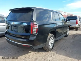 2023 Chevrolet Tahoe LT with VIN 1GNSCNKD9PR191296, listed as a IAAI auction lot 41814835 with 64,777 mi miles. Bid and sale history available at carsss.com. Image 4.