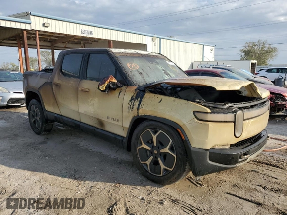 2023 Rivian R1T Adventure z VIN 7FCTGBAA6PN028517, wystawiony jako Copart lot #73712354 z przebiegiem Nie podano mil oraz Nie do naprawy. Historia ofert i sprzedaży dostępna na DreamBid. Obrazek 4.