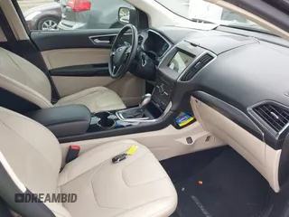 2015 Ford Edge Titanium z VIN 2FMTK3K81FBB88882, wystawiony jako IAAI lot #42184698 z przebiegiem 161 858 mil mil oraz . Historia ofert i sprzedaży dostępna na DreamBid. Obrazek 5.