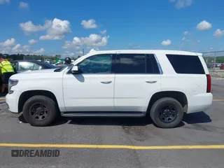2018 Chevrolet Tahoe Commercial z VIN 1GNLCDEC1JR155210, wystawiony jako IAAI lot #42845068 z przebiegiem 159 456 mil mil oraz . Historia ofert i sprzedaży dostępna na DreamBid. Obrazek 14.