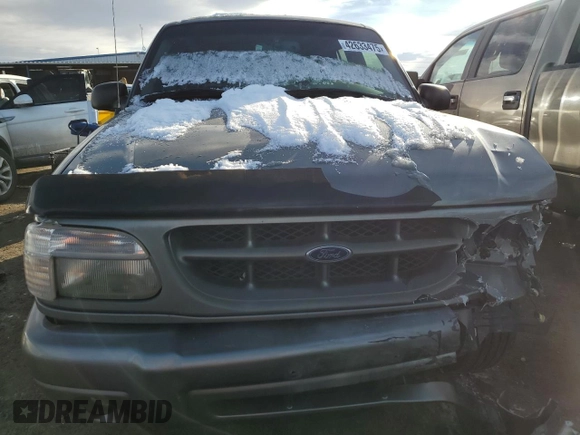 2000 Ford Explorer z VIN 1FMDU85P4YZA19051, wystawiony jako Copart lot #42633475 z przebiegiem 81 050 mil mil oraz Szkoda całkowita • Salvage title. Historia ofert i sprzedaży dostępna na DreamBid. Obrazek 5.