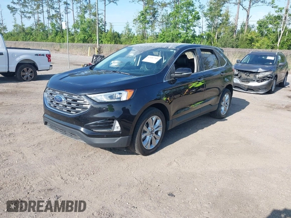 2022 Ford Edge Titanium with VIN 2FMPK4K99NBA45354, listed as a IAAI auction lot 42187761 with 75,458 mi miles and . Bid and sale history available at DreamBid. Image 2.