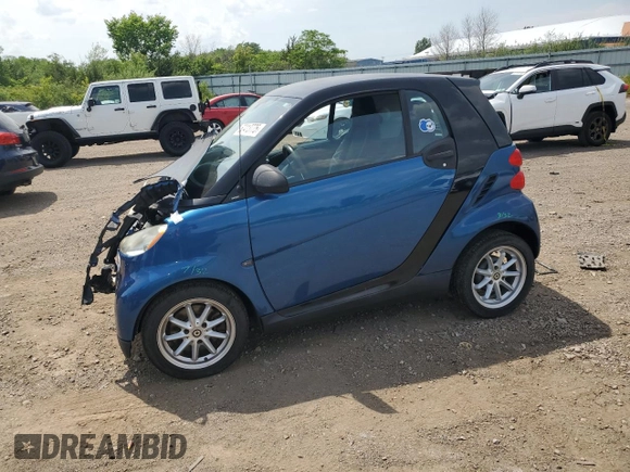 2009 Smart fortwo Pure with VIN WMEEJ31X59K218003, listed as a Copart auction lot 62413775 with 82,711 mi miles and Salvage title. Bid and sale history available at DreamBid. Image 1.