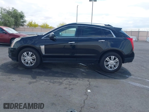 2014 Cadillac SRX Luxury Collection z VIN 3GYFNEE30ES650372, wystawiony jako IAAI lot #42195783 z przebiegiem 169 113 mil mil oraz . Historia ofert i sprzedaży dostępna na DreamBid. Obrazek 14.