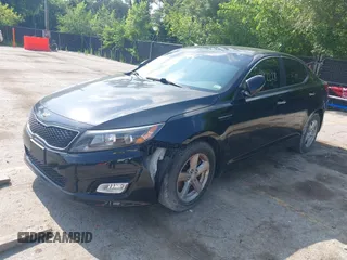 2015 Kia Optima LX with VIN 5XXGM4A75FG392731, listed as a IAAI auction lot 42792228 with 153,081 mi miles and . Bid and sale history available at DreamBid. Image 2.