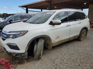 2017 Honda Pilot Touring z VIN 5FNYF6H92HB067140, wystawiony jako Copart lot #72200584 z przebiegiem 127 856 mil mil oraz Szkoda całkowita • Salvage title. Historia ofert i sprzedaży dostępna na DreamBid. Obrazek 1.