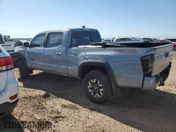 2021 Toyota Tacoma SR5 with VIN 3TMDZ5BN9MM099515, listed as a Copart auction lot 56687385 with 66,721 mi miles and Salvage title. Bid and sale history available at DreamBid. Image 2.