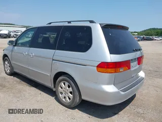2003 Honda Odyssey EX-L z VIN 5FNRL18053B088851, wystawiony jako IAAI lot #42197114 z przebiegiem 219 456 mil mil oraz . Historia ofert i sprzedaży dostępna na DreamBid. Obrazek 3.