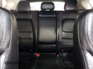 2021 Mazda CX-5 Touring with VIN JM3KFBCM7M0467530, listed as a Copart auction lot 42238385 with 33,277 mi miles and Salvage Title. Bid and sale history available at carsss.com. Image 10.