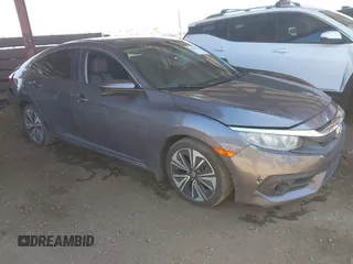 2017 Honda Civic EX-L z VIN 19XFC1F70HE030887, wystawiony jako IAAI lot #42184278 z przebiegiem 108 036 mil mil oraz . Historia ofert i sprzedaży dostępna na DreamBid. Obrazek 1.