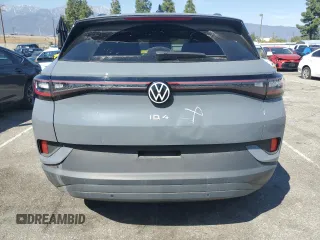 2023 Volkswagen ID.4 Pro with VIN 1V2VMPE86PC042164, listed as a Copart auction lot 50260215 with 4,328 mi miles and Clean Title. Bid and sale history available at DreamBid. Image 6.