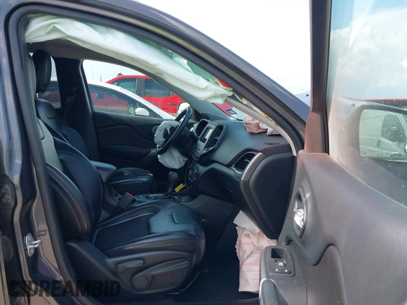 2019 Jeep Cherokee Latitude Plus with VIN 1C4PJLLB3KD143546, listed as a IAAI auction lot 42160353 with 69,296 mi miles and . Bid and sale history available at DreamBid. Image 5.