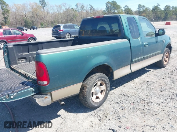 2000 Ford F-150 XL with VIN 1FTRX17L0YNA81220, listed as a IAAI auction lot 41912237 with 107,586 mi miles. Bid and sale history available at carsss.com. Image 4.