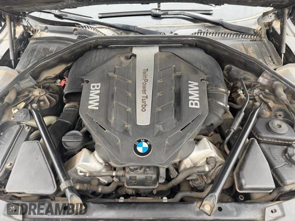 2012 BMW 7 Series 750i с VIN WBAKA8C5XCDX01120, выставлен на аукционе Copart как лот 47065425 с пробегом 71 313 миль миль и Списание • Salvage title. История ставок и продаж доступна на DreamBid. Изображение 7.