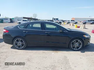 2016 Ford Fusion Titanium with VIN 3FA6P0D91GR237742, listed as a IAAI auction lot 41892627 with 73,616 mi miles and . Bid and sale history available at DreamBid. Image 13.