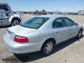 2005 Mercury Sable LS with VIN 1MEFM55S25A607510, listed as a IAAI auction lot 41956186 with 392,589 mi miles. Bid and sale history available at carsss.com. Image 4.