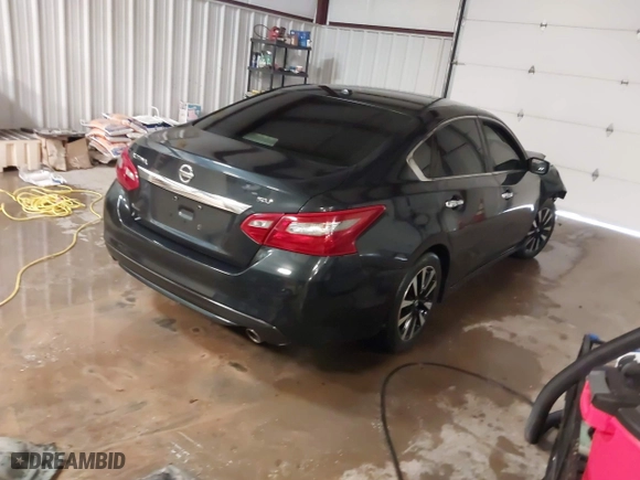 2018 Nissan Altima 2.5 SV with VIN 1N4AL3AP1JC276024, listed as a IAAI auction lot 41271383 with 121,088 mi miles. Bid and sale history available at carsss.com. Image 4.