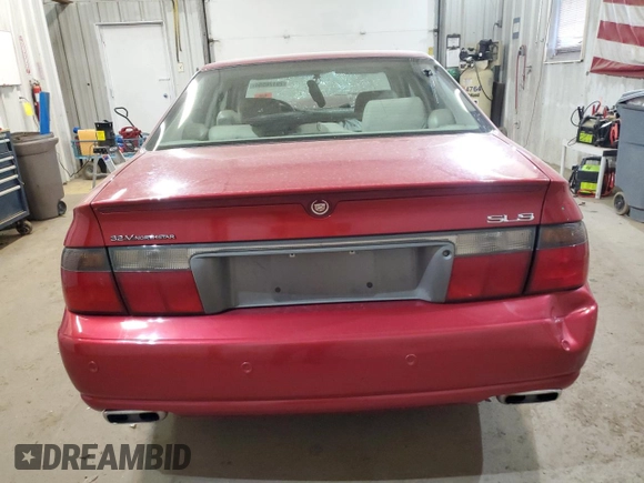 2002 Cadillac Seville Luxury SLS z VIN 1G6KS54Y32U254686, wystawiony jako Copart lot #79178554 z przebiegiem Nie podano mil oraz Szkody całkowita. Historia ofert i sprzedaży dostępna na DreamBid. Obrazek 6.