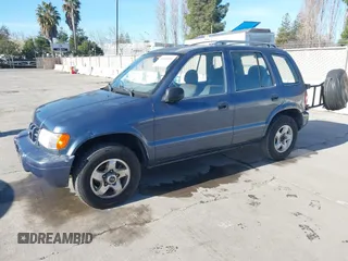 2001 Kia Sportage with VIN KNDJB723015065059, listed as a IAAI auction lot 41554856 with 170,827 mi miles. Bid and sale history available at carsss.com. Image 2.